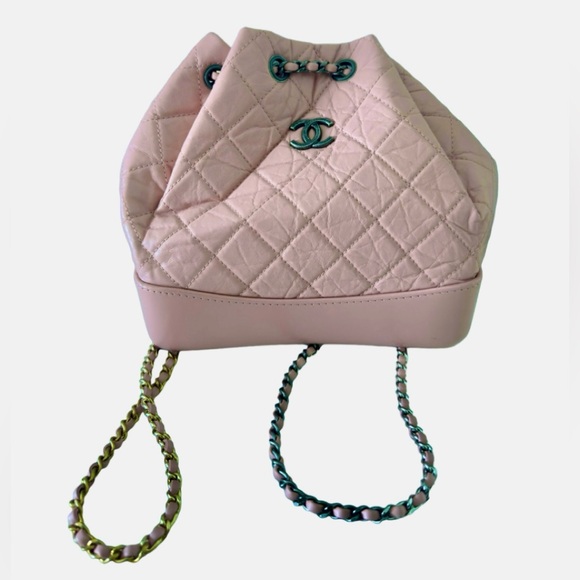 CHANEL Handbags - Chanel mini pink drawstring bag